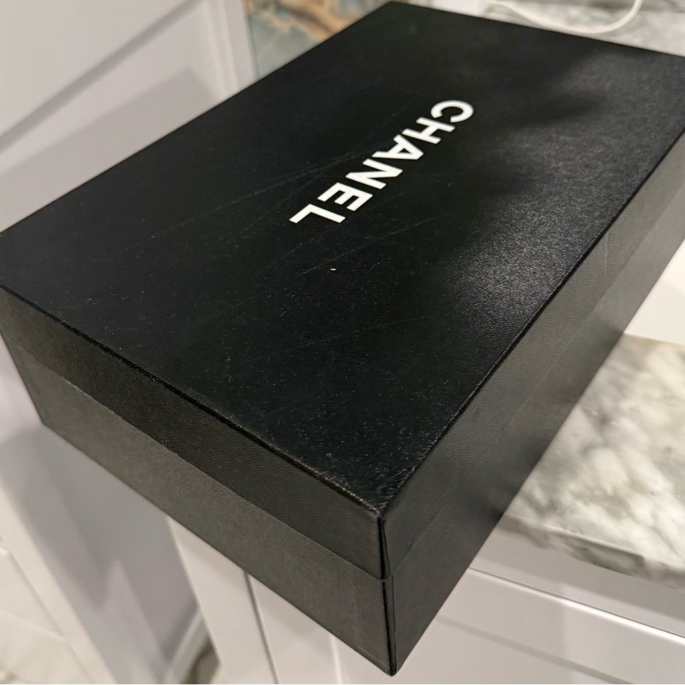 CHANEL Black Quilted Flats with Silver Cap-Toe - Picture 2 of 6